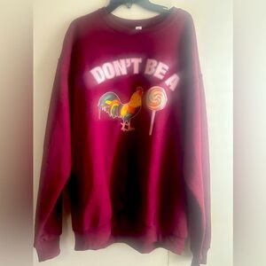 Men’s burgundy sweater never worn. Size Large
